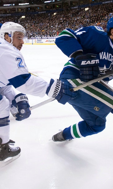 Nikita Kucherov scores in OT, lifts Lightning past Canucks
